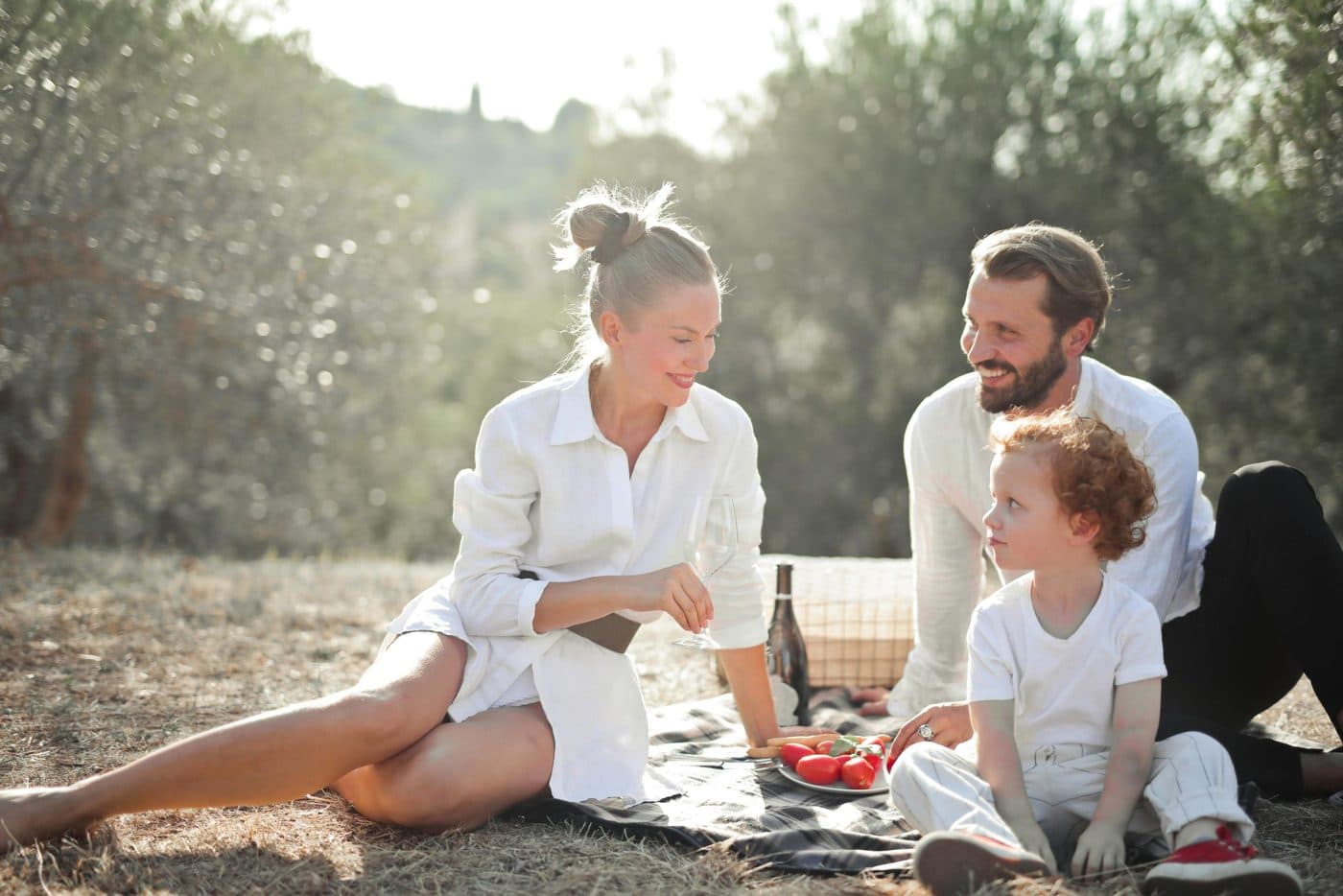 A family enjoying a picnic together outdoors