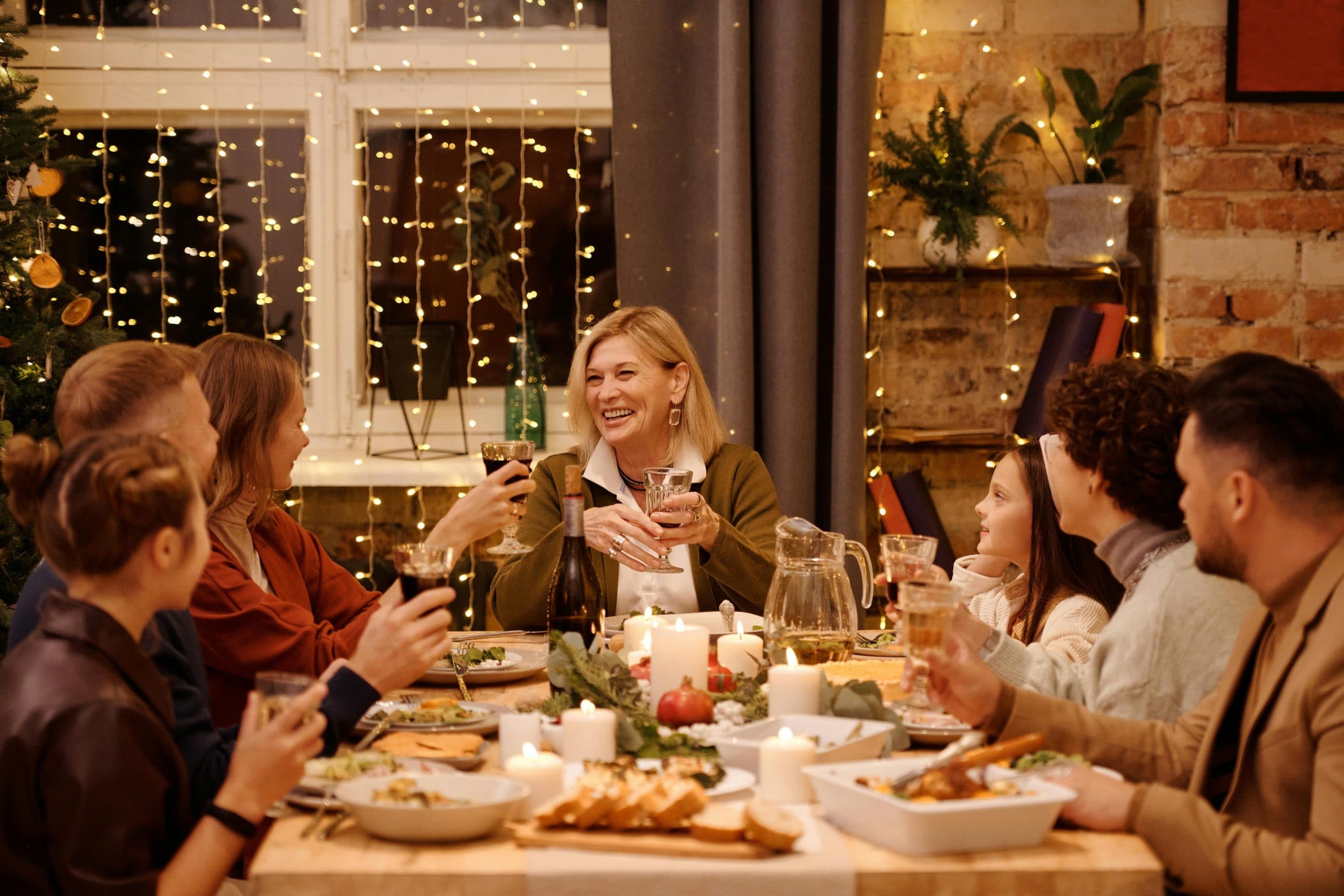 Grandmother celebrating with family at dinner